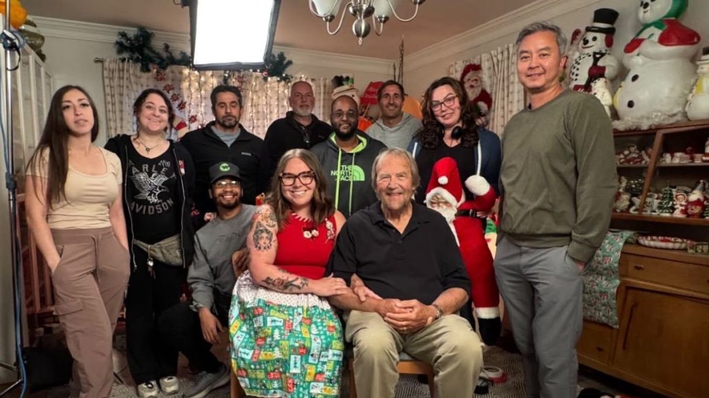 Hope and her dad with the production crew of Hoarding for the Holidays, episode #1 "A Real Life Elf."