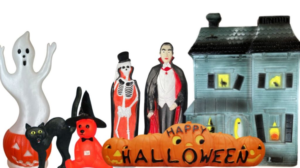 Variety of Union Products Halloween blow molds including ghost, black cat, bear, grim reaper, Bela Lugosi, Happy Halloween jack o'lantern sign & haunted house
